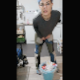 A German, brunette woman with short hair and lip piercings takes a long, smooth shit into a trash bucket. She wipes her ass and smiles at the camera when done. 720P vertical HD format. About a minute.